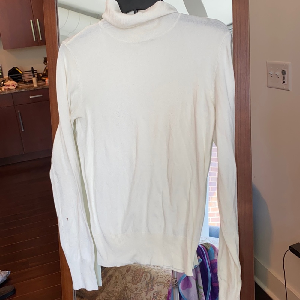 White turtleneck sweater